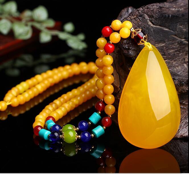 Pendant Necklaces Natural Beeswax Chicken Yellow Sweater Chain Original Stone Drop Necklace
Pendant Necklaces Natural Beeswax Chicken Yellow Sweater Chain Original Stone Drop Necklace