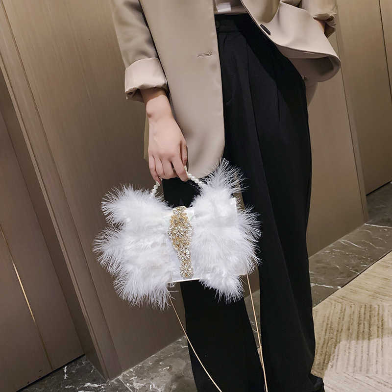 Evening Bags Turkey Ostrich Hair Slant Across Women's Bag Korean Fashion Pearl Chain Inlaid with Diamond Fur Dinner Fur Bag 220920, Pink
Evening Bags Turkey Ostrich Hair Slant Across Women's Bag Korean Fashion Pearl Chain Inlaid with Diamond Fur Dinner Fur Bag 220920, Pink