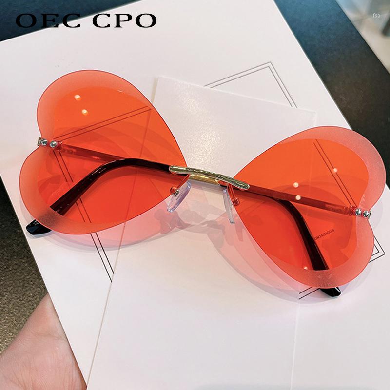 Sunglasses OEC CPO Rimless Heart Shaped Ladies Brand Designer Candy Color Women Fashion Framless Eyewear Female Uv400
Sunglasses OEC CPO Rimless Heart Shaped Ladies Brand Designer Candy Color Women Fashion Framless Eyewear Female Uv400
