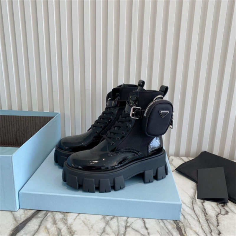 2022 Women Rois martin boots military inspired combat bootss nylon pouch attached to the ankle with strap Ankles boot top quality black matte patent leather shoes
2022 Women Rois martin boots military inspired combat bootss nylon pouch attached to the ankle with strap Ankles boot top quality black matte patent leather shoes