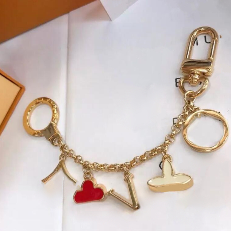Luxury Designer Keychain Fashion Classic Brand Key Buckle Flower Letter Key Chain Handmade Gold Keychains Mens Womens Bag Pendant
Luxury Designer Keychain Fashion Classic Brand Key Buckle Flower Letter Key Chain Handmade Gold Keychains Mens Womens Bag Pendant