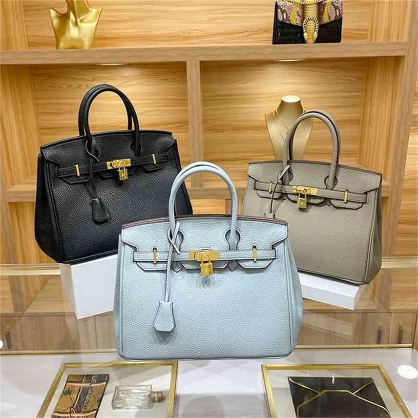 Bags Women's bag 2022 new women's litchi pattern high-capacity messenger sling one shoulder portable Purse, White
Bags Women's bag 2022 new women's litchi pattern high-capacity messenger sling one shoulder portable Purse, White