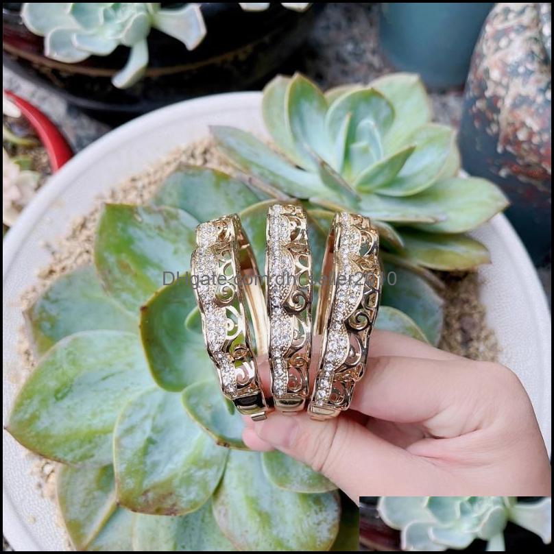Bangle Bangle Neovisson Gold Color Algeria Morocco Women Bracelet Crystal Dubai African Jewelry Hollow Pattern Banquet Drop Delivery Dhhv8
Bangle Bangle Neovisson Gold Color Algeria Morocco Women Bracelet Crystal Dubai African Jewelry Hollow Pattern Banquet Drop Delivery Dhhv8