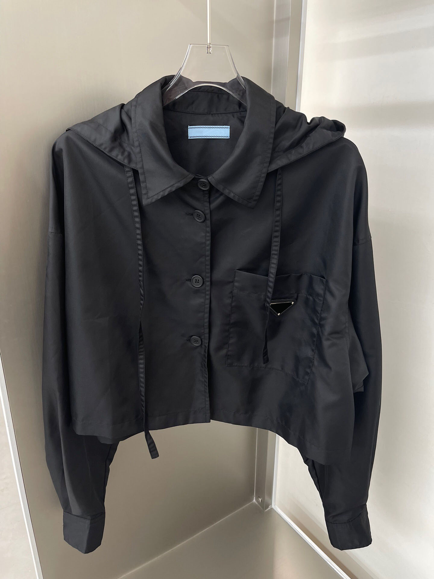 2022 New Fashion Triangle Pattern Solid Black Hooded Jacket Women Lapel Long Sleeve Single Breasted Pockets Loose Retro Coat
2022 New Fashion Triangle Pattern Solid Black Hooded Jacket Women Lapel Long Sleeve Single Breasted Pockets Loose Retro Coat