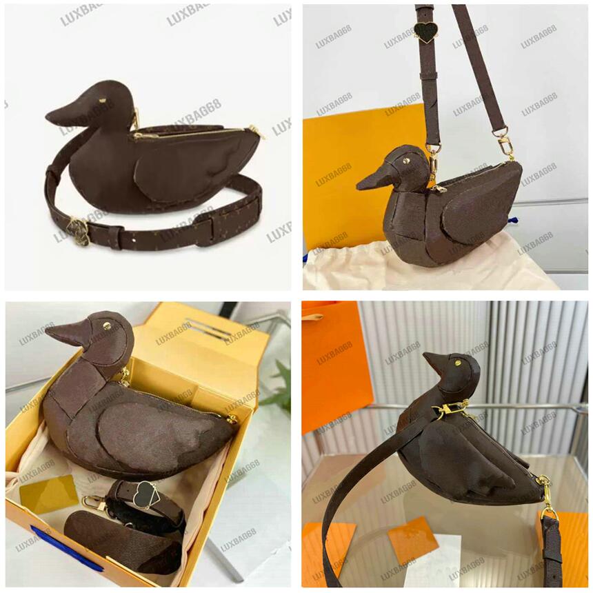 NIGO Drop 2 Crossbody Bag Ducks Monograms Brown Leather Shoulder Purse Japanese designer Luxurys Duck Shape Pouch M45590, #01
NIGO Drop 2 Crossbody Bag Ducks Monograms Brown Leather Shoulder Purse Japanese designer Luxurys Duck Shape Pouch M45590, #01
