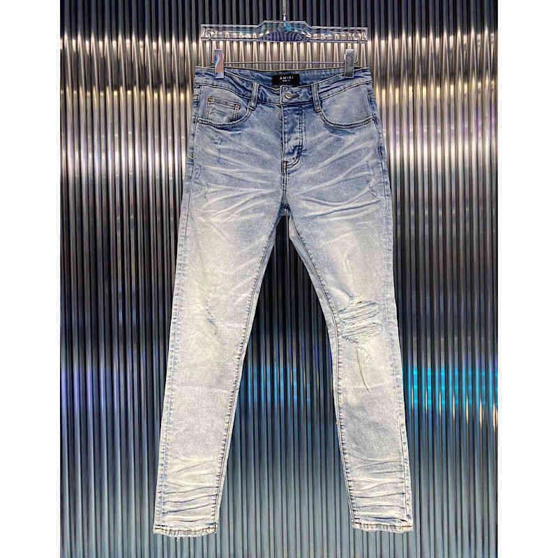 new European and American high street amirs washed light blue classic knee hole slim fit small foot jeans men WXT
new European and American high street amirs washed light blue classic knee hole slim fit small foot jeans men WXT