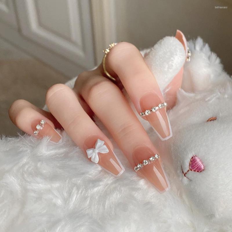 False Nails Selling Winter Fashion Ultra Thin Nail Wearing French Nude Bow Diamond Studded Ballet Coffin Press On, Jp2236-b3
False Nails Selling Winter Fashion Ultra Thin Nail Wearing French Nude Bow Diamond Studded Ballet Coffin Press On, Jp2236-b3