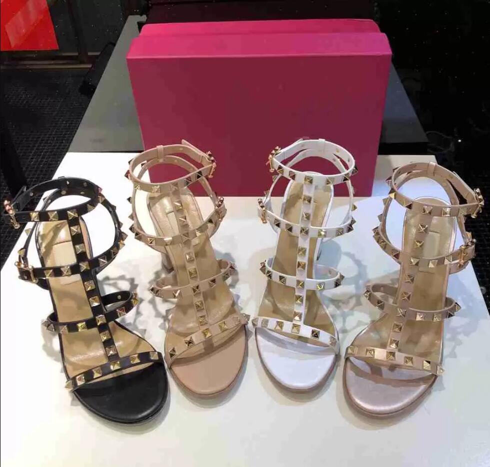 Luxurys Women's Sandals Chunky Heels 2-Straps Rivets Patent Leather Studs Sandal Women Brand Dress Shoes Black White Nude Summer Big Size 35-44
Luxurys Women's Sandals Chunky Heels 2-Straps Rivets Patent Leather Studs Sandal Women Brand Dress Shoes Black White Nude Summer Big Size 35-44