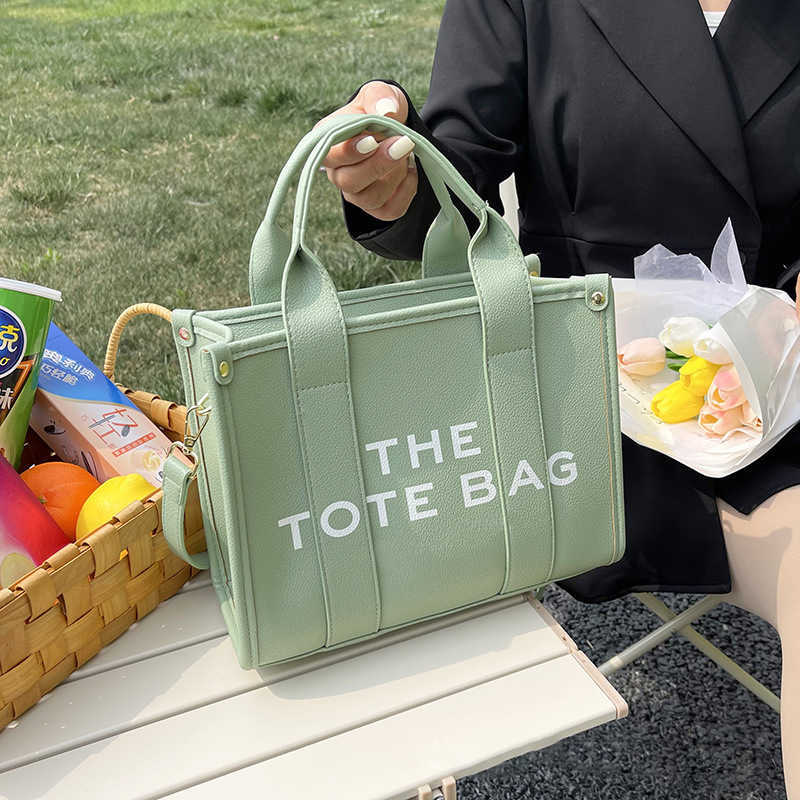 Marc Tote Bag Evening s Deigner Handbag Women Shopping Shoulder Wallet Pure Caual Large Travel Luxury Leather Letter Print Crobody
Marc Tote Bag Evening s Deigner Handbag Women Shopping Shoulder Wallet Pure Caual Large Travel Luxury Leather Letter Print Crobody