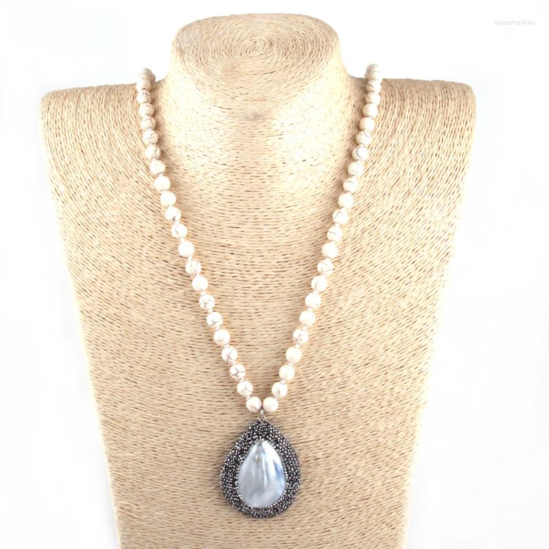 Pendant Necklaces Fashion 8mm Beige Stone Long Knotted Handmade Crystal Paved Pearl Shell Drop Women Ethnic Necklace
Pendant Necklaces Fashion 8mm Beige Stone Long Knotted Handmade Crystal Paved Pearl Shell Drop Women Ethnic Necklace