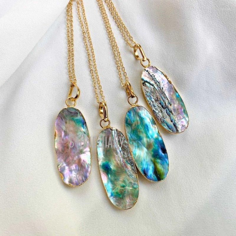 Pendant Necklaces NM36566 Oval Abalone Seashell Necklace Gold Filled Chain Genuine Shell Beachy Rainbow Charm
Pendant Necklaces NM36566 Oval Abalone Seashell Necklace Gold Filled Chain Genuine Shell Beachy Rainbow Charm