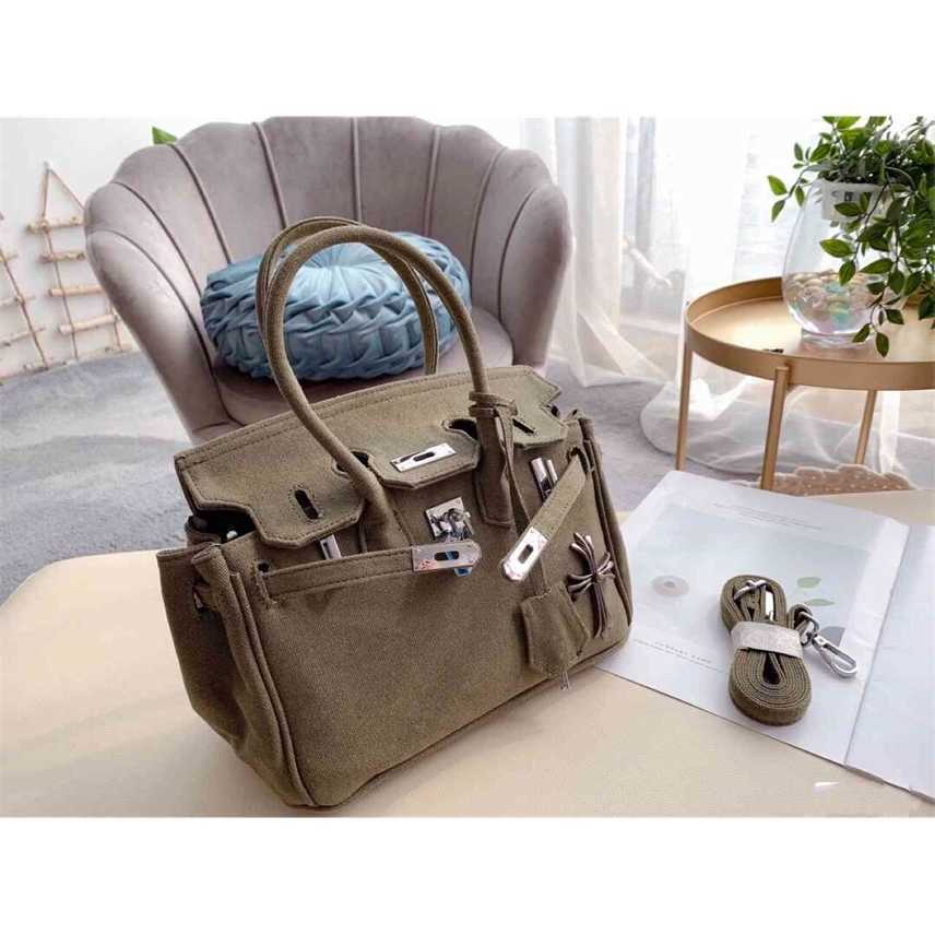 Clearance Autumn and winter prepuce belt decoration horizontal style square Khaki middle lock soft hle solid color women's bag, 2620
Clearance Autumn and winter prepuce belt decoration horizontal style square Khaki middle lock soft hle solid color women's bag, 2620
