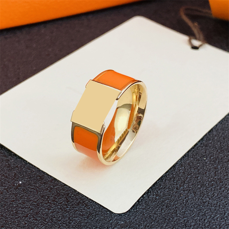 Fashion designer gold letter band ring bague for men women lady Party mens wedding rings lovers gift engagement South American jewelry 13 colors size Wide
Fashion designer gold letter band ring bague for men women lady Party mens wedding rings lovers gift engagement South American jewelry 13 colors size Wide