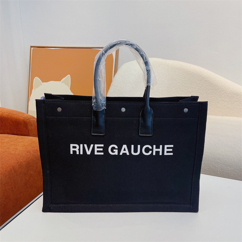 Womens Tote Bag Designer Rive Gauche Handbag Fashion Shopping Bag Luxury Brand Canvas Totes Handbags Large Casual Beach Bags 4 Colors, Y1
Womens Tote Bag Designer Rive Gauche Handbag Fashion Shopping Bag Luxury Brand Canvas Totes Handbags Large Casual Beach Bags 4 Colors, Y1