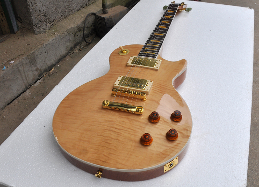 Factory Natural wood color electric guitar with Gold Hardware rosewood fingerboard Flame Maple Veneer can be customized
Factory Natural wood color electric guitar with Gold Hardware rosewood fingerboard Flame Maple Veneer can be customized