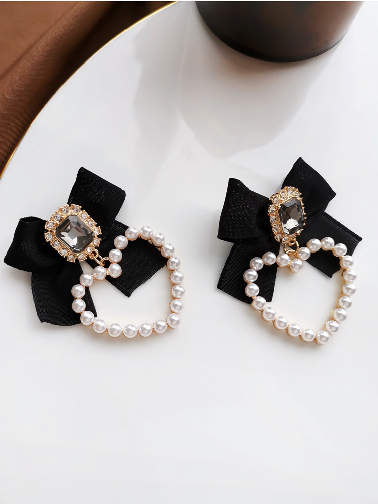 Charm S925 needle Sweet Jewelry Black Bowknot Earrings Design Crystal Glass Simulated Pearls Heart Drop For Girl 221119
Charm S925 needle Sweet Jewelry Black Bowknot Earrings Design Crystal Glass Simulated Pearls Heart Drop For Girl 221119