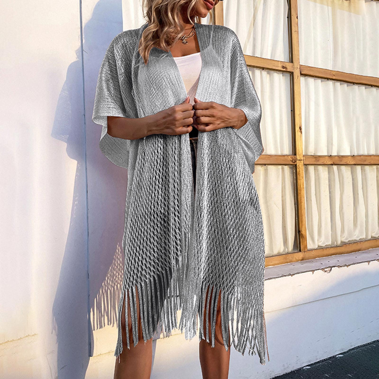 Women's Knits Tees Summer Solid Color Kimono Tassel Knitted Hollow Casual Cardigan Sun Protection Shirt Fringed Cape Cover Up Smock Coat 221123