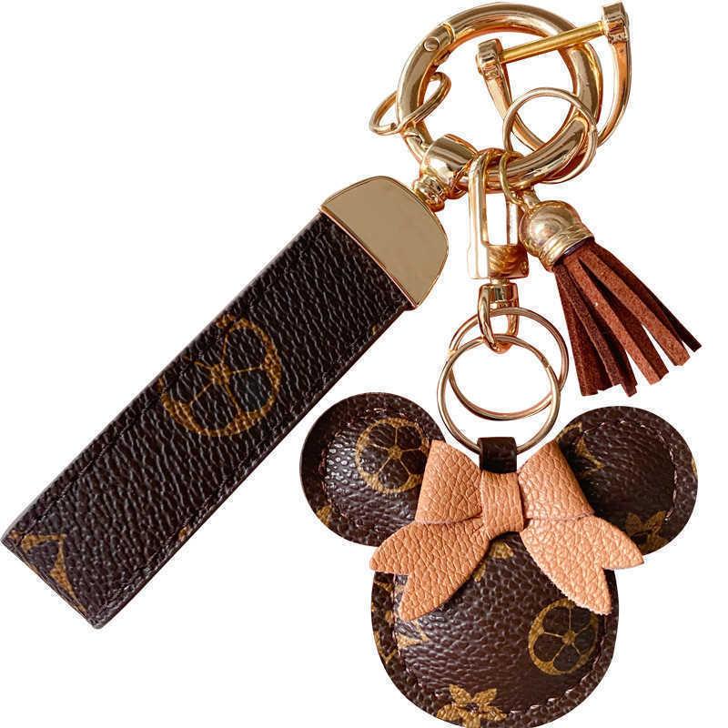 Mouse Design Car Keychain Favor Flower Bag Pendant Charm Jewelry Keyring Holder for Men Gift Fashion PU Leather Animal Key Chain Accessories
Mouse Design Car Keychain Favor Flower Bag Pendant Charm Jewelry Keyring Holder for Men Gift Fashion PU Leather Animal Key Chain Accessories