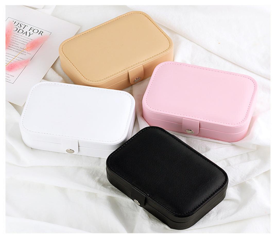 Portable PU leather fresh and simple earrings ring multifunction storage Double deck jewelry box
Portable PU leather fresh and simple earrings ring multifunction storage Double deck jewelry box