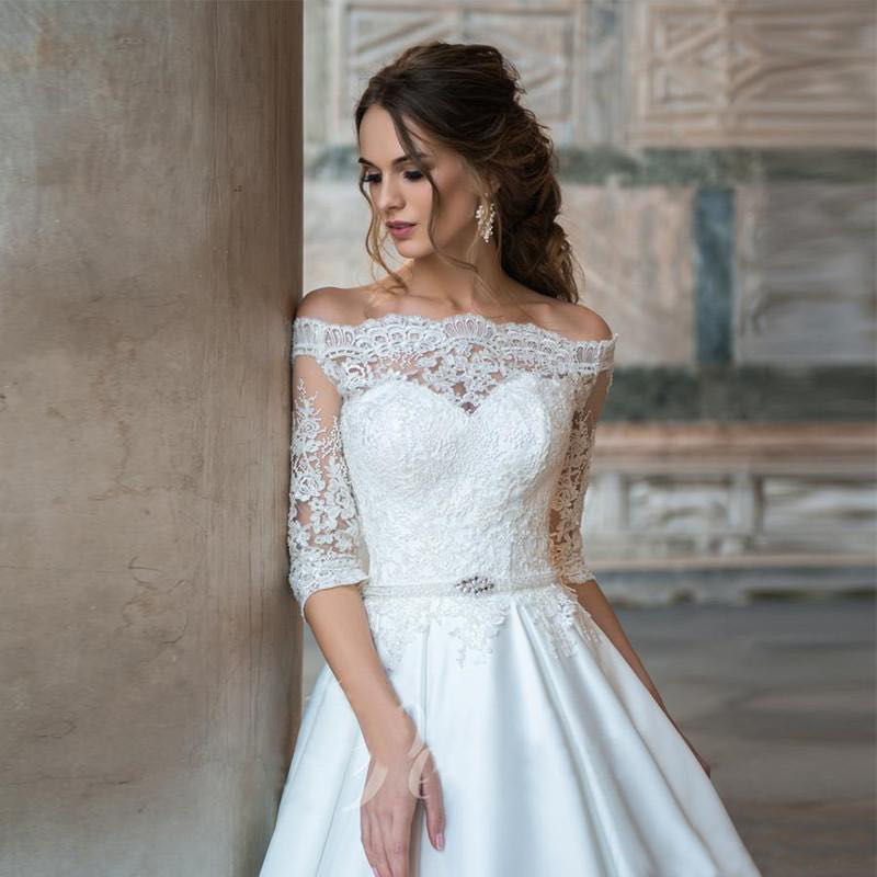 2023 Lace a line Wedding Dresses off shoulder satin Long sweep train Beaded Overskirt Dubai Arabic plus size Bridal Gowns