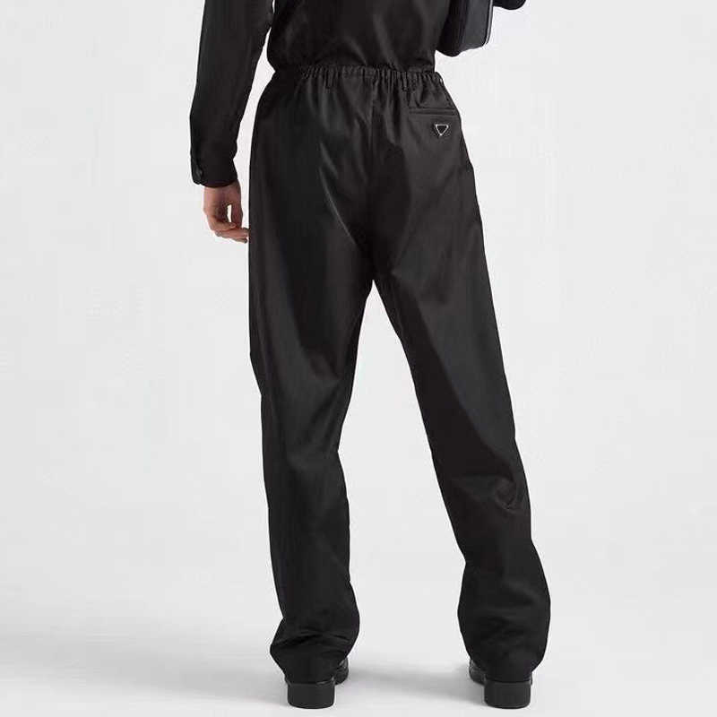 Triangle Lable Nylon Pants Overalls Detachable Black Pants Man Woman Fashion Highstreet Drawstring FZKZ397
Triangle Lable Nylon Pants Overalls Detachable Black Pants Man Woman Fashion Highstreet Drawstring FZKZ397