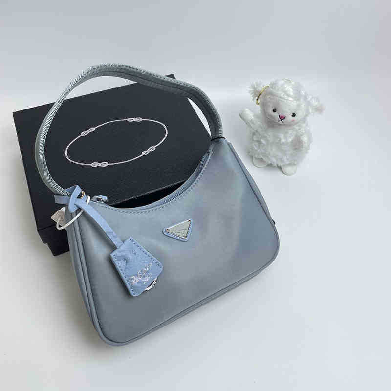 quality Prad Top New Women's Re-edition 2005 tote Nylon leather Shoulder Bag Luxury Designer Women's Shoulder Bag Crossbody Bags Handbag Y220601, Blue
quality Prad Top New Women's Re-edition 2005 tote Nylon leather Shoulder Bag Luxury Designer Women's Shoulder Bag Crossbody Bags Handbag Y220601, Blue