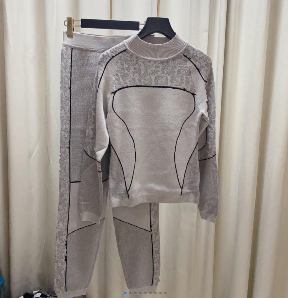 Women's 22 Two Piece Pants Sweater Knitted Long Sleeve T-shirt P ants with hole picking and waist shrinking suit Wear age reducing s weater inside and outside 1120, Customize
Women's 22 Two Piece Pants Sweater Knitted Long Sleeve T-shirt P ants with hole picking and waist shrinking suit Wear age reducing s weater inside and outside 1120, Customize