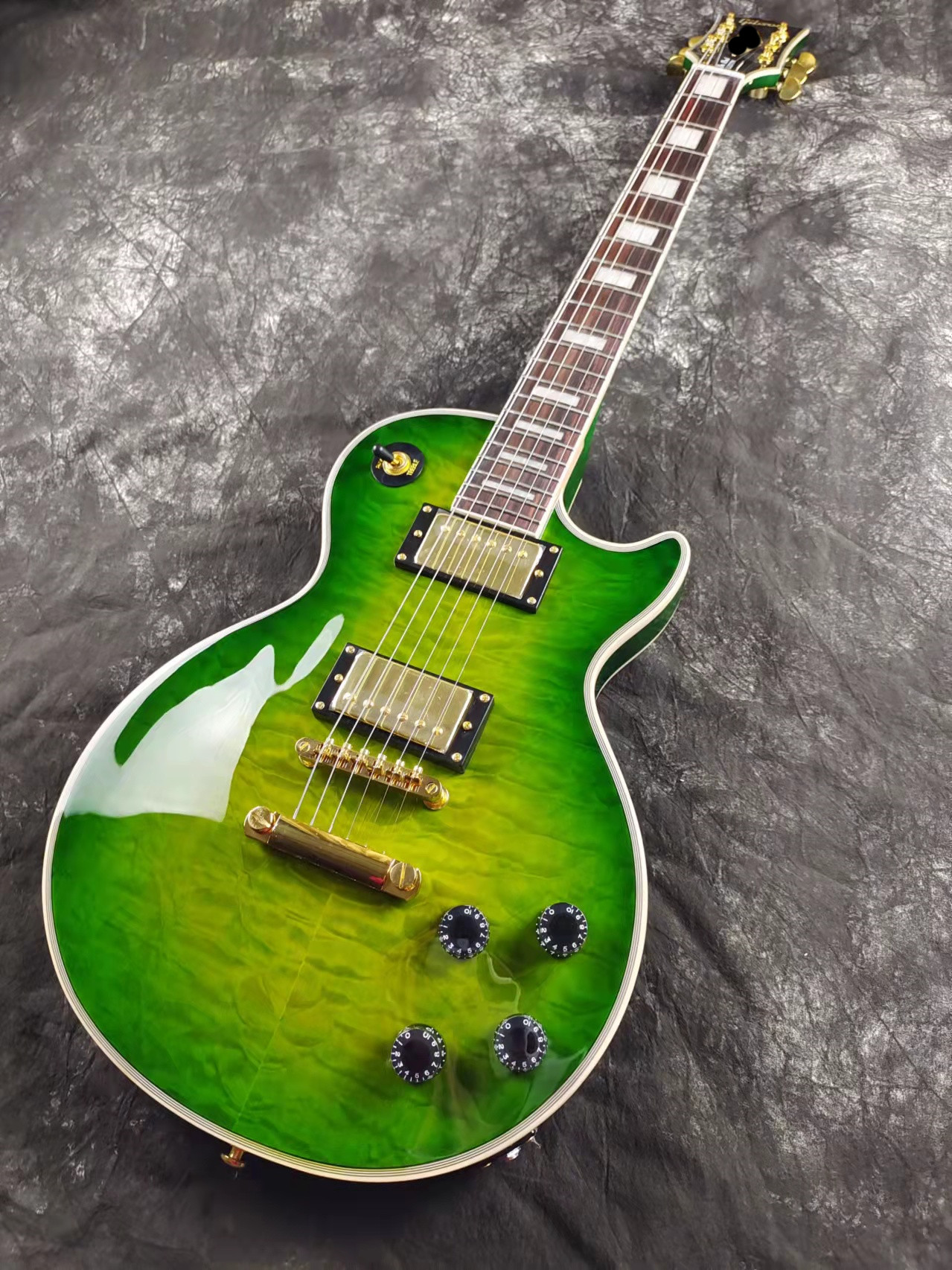 Recommended LP standard electric guitar green big flower gold accessories imported environment-friendly paint for quick delivery
Recommended LP standard electric guitar green big flower gold accessories imported environment-friendly paint for quick delivery