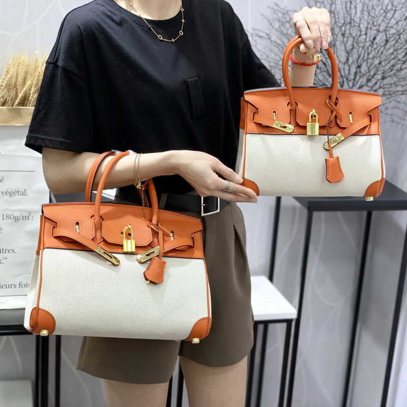 Designer Bags Hem Handbags Women Cluth Fashion Top Layer Lychee Grain Cow Leather with Linen Canvas Handbag Messenger Togo Pu Luxury U2h3, 25cm black
Designer Bags Hem Handbags Women Cluth Fashion Top Layer Lychee Grain Cow Leather with Linen Canvas Handbag Messenger Togo Pu Luxury U2h3, 25cm black