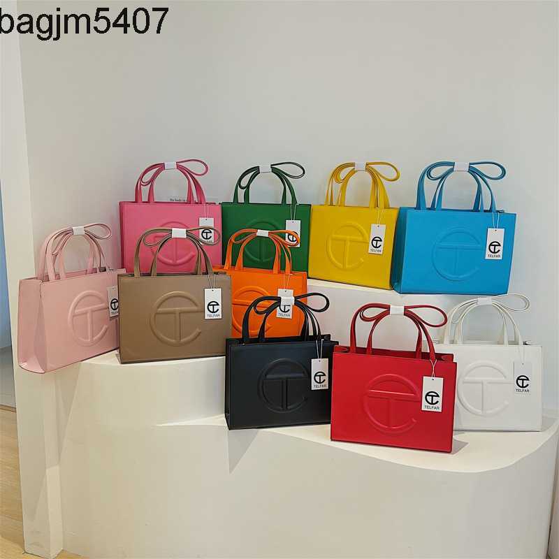 Design Bag Factory Wholesale and Retail Letter Shell Small Simple Shopping Texture Hand Women's Large Capacity Single Shoulder Cross Body Tote, Orange 
Design Bag Factory Wholesale and Retail Letter Shell Small Simple Shopping Texture Hand Women's Large Capacity Single Shoulder Cross Body Tote, Orange