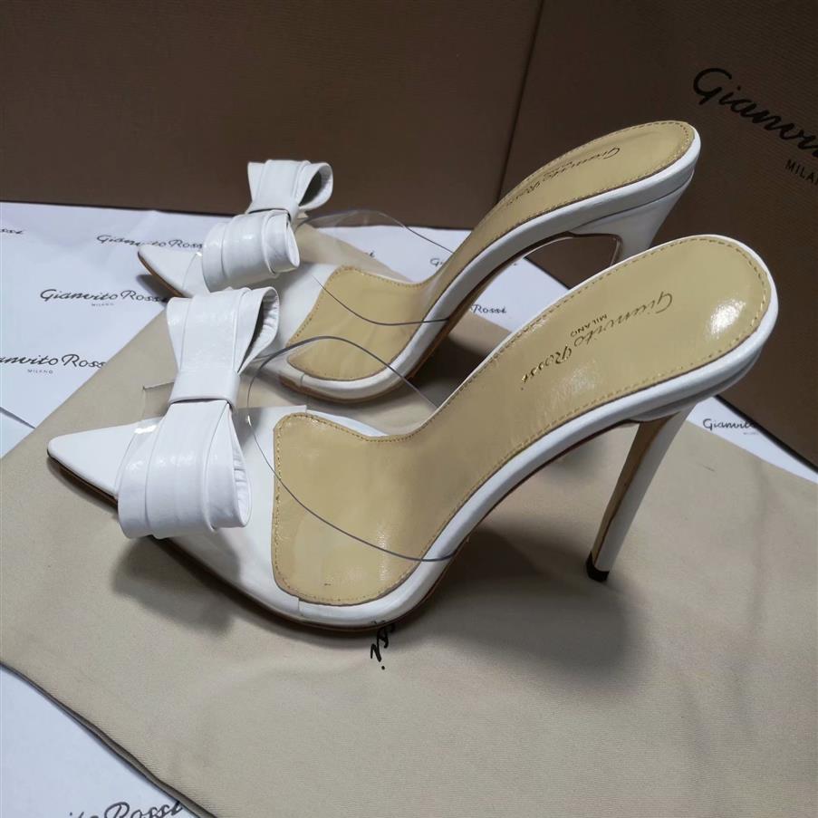 Gianvito Rossi White Sliver Black Bowtie Ladies Summer Mules Shoes High Heeled Female Dress Wedding Party PVC Sandals Slippers Wom213p
Gianvito Rossi White Sliver Black Bowtie Ladies Summer Mules Shoes High Heeled Female Dress Wedding Party PVC Sandals Slippers Wom213p