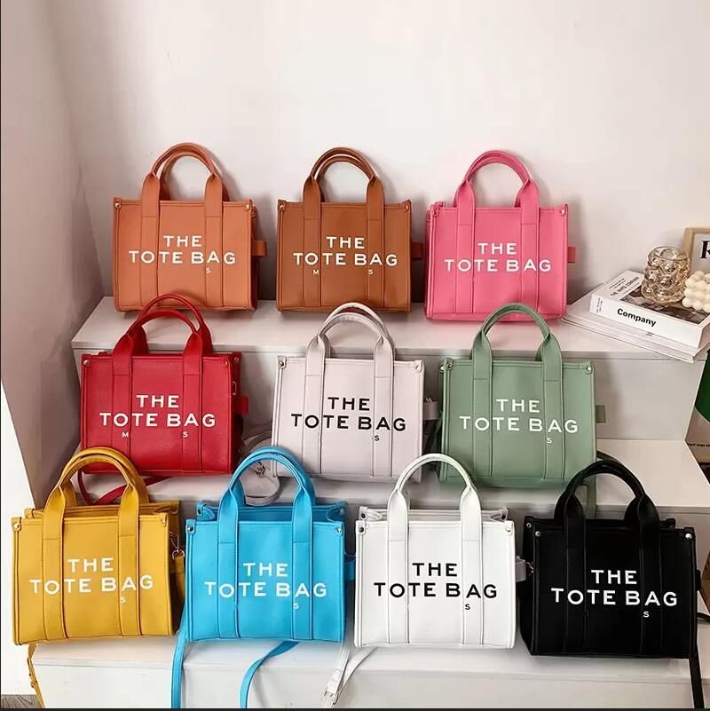 2022 New Designer The Tote Bag High Quality Women Luxury Designer Bags Canvas Practical Large Capacity Plain Handbags Coin Purse Square Wallets 26/21/10cm, White
2022 New Designer The Tote Bag High Quality Women Luxury Designer Bags Canvas Practical Large Capacity Plain Handbags Coin Purse Square Wallets 26/21/10cm, White