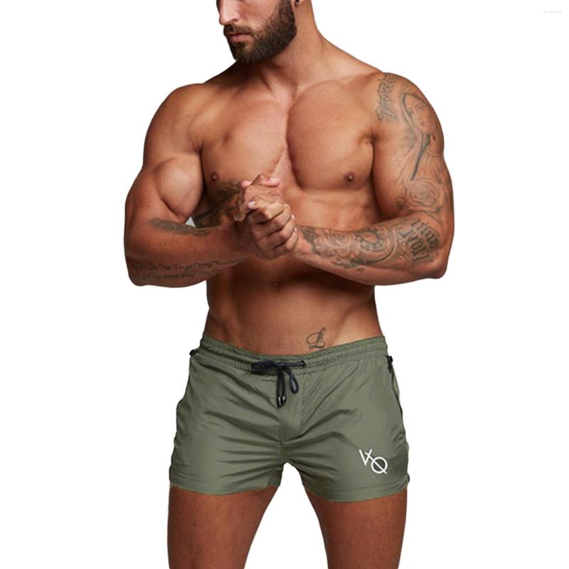 Gym Clothing Men's Short Pants Solid Color Muscle Fitness Running Training Shorts Compression Workout Sportswear
Gym Clothing Men's Short Pants Solid Color Muscle Fitness Running Training Shorts Compression Workout Sportswear