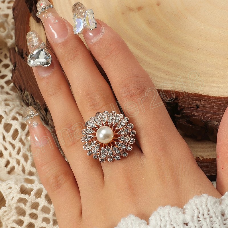 Exquisite Pearl Crystal Flower Ring Fashion Temperament Opening Ring for Women Girl Korean Wedding Party Jewelry Gift
Exquisite Pearl Crystal Flower Ring Fashion Temperament Opening Ring for Women Girl Korean Wedding Party Jewelry Gift