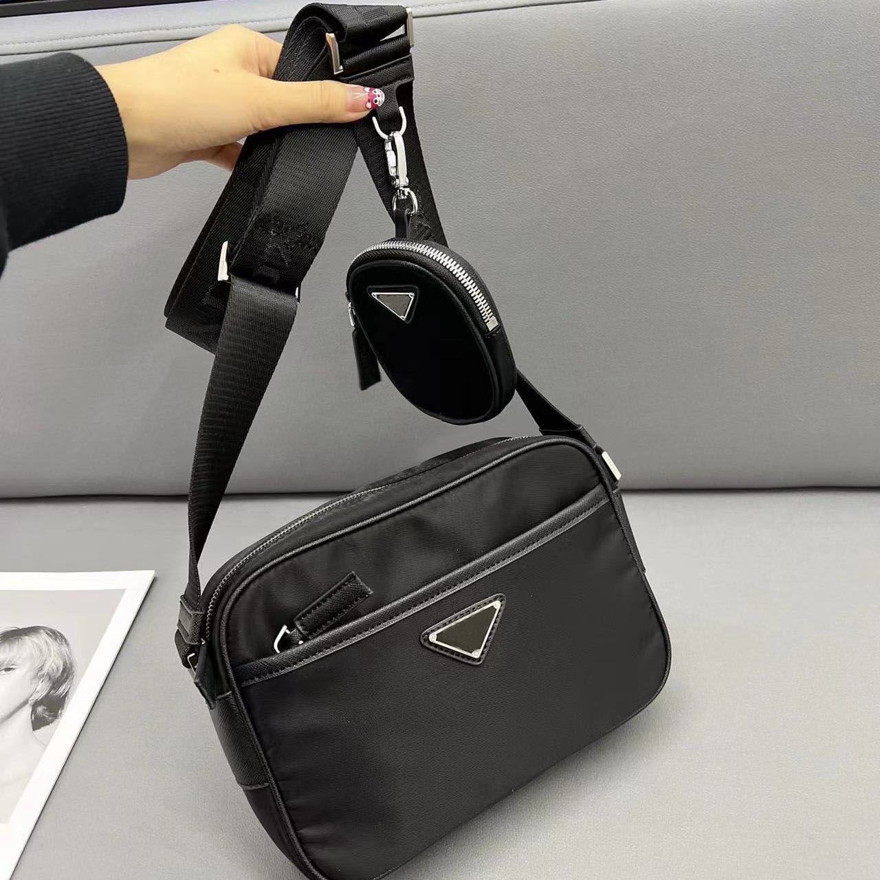 2022 designer Nylon Bags PARIS new two in one messenger handbag of P family One shoulder diagonal crossbody bag Classic versatile men's and women's commuter handbags, Black
2022 designer Nylon Bags PARIS new two in one messenger handbag of P family One shoulder diagonal crossbody bag Classic versatile men's and women's commuter handbags, Black