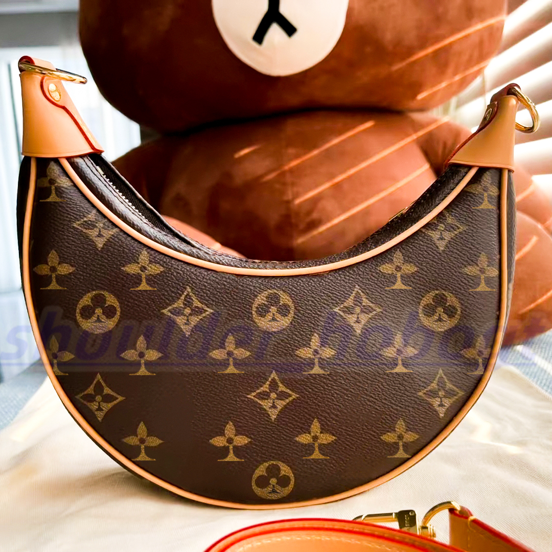 Luxurys Designers LOOP half moon M81098 Shoulder Bag leather wallet clutch latest handbag Women's men two shoulder straps Metal fittings tote crossbody sling Peas, Mon0gram
Luxurys Designers LOOP half moon M81098 Shoulder Bag leather wallet clutch latest handbag Women's men two shoulder straps Metal fittings tote crossbody sling Peas, Mon0gram