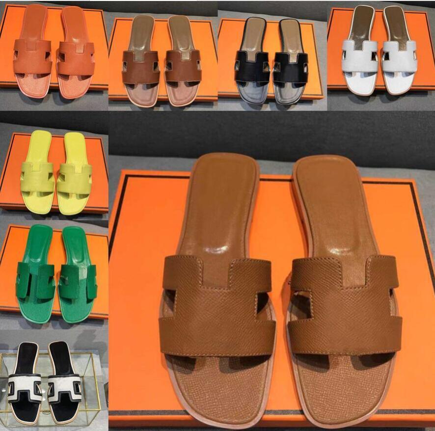 Designer orans sandals Luxury Slippers Slides flat women shoes Genuine Leather Sandal Summer Flip Flops Sneaker Beach Slide Party slipper, Box
Designer orans sandals Luxury Slippers Slides flat women shoes Genuine Leather Sandal Summer Flip Flops Sneaker Beach Slide Party slipper, Box