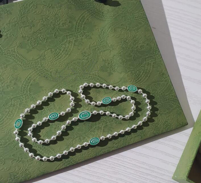 designer quality luxury jewelry gold chain pendants bijoux S925 Sterling silver interlock double large G green enamel bead necklace
designer quality luxury jewelry gold chain pendants bijoux S925 Sterling silver interlock double large G green enamel bead necklace