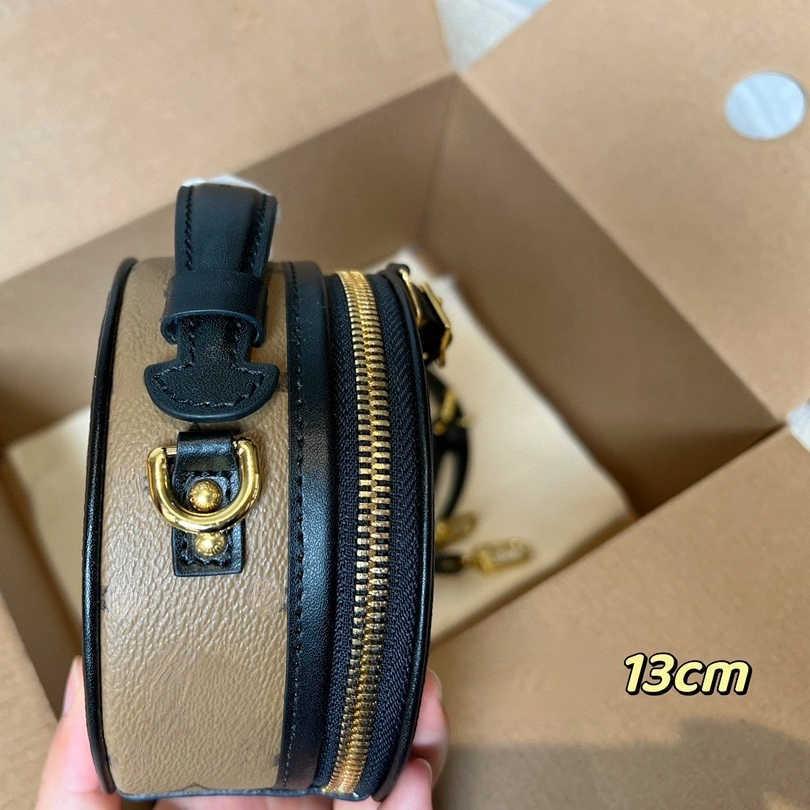 Shoulder Bags 2022 New portable mini round cake one shoulder cross body women's small bag Old flower caramel color Color contrast
Shoulder Bags 2022 New portable mini round cake one shoulder cross body women's small bag Old flower caramel color Color contrast