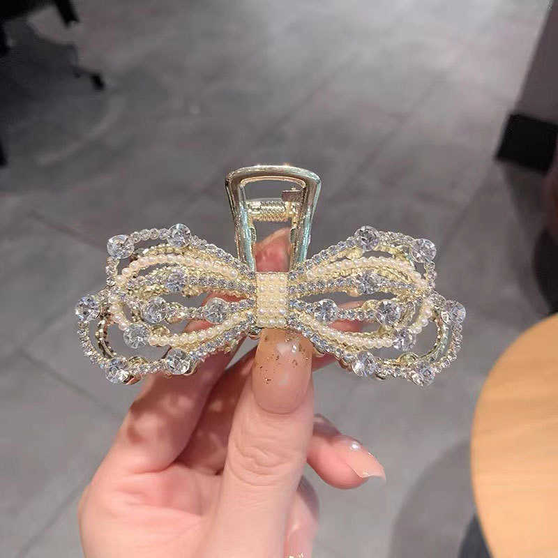 Hair Clips Korean high-grade bow tie large grab back head curling red temperament heavy industry new shark clip
Hair Clips Korean high-grade bow tie large grab back head curling red temperament heavy industry new shark clip