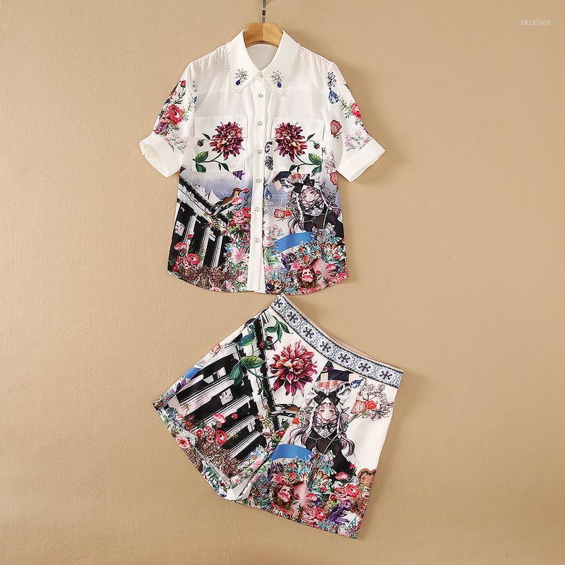 Women' Tracksuits European And American Women' Wear 2022 Style Short Sleeved Shirt Beaded Lapels Architectural Floral Print Shorts, White
Women' Tracksuits European And American Women' Wear 2022 Style Short Sleeved Shirt Beaded Lapels Architectural Floral Print Shorts, White