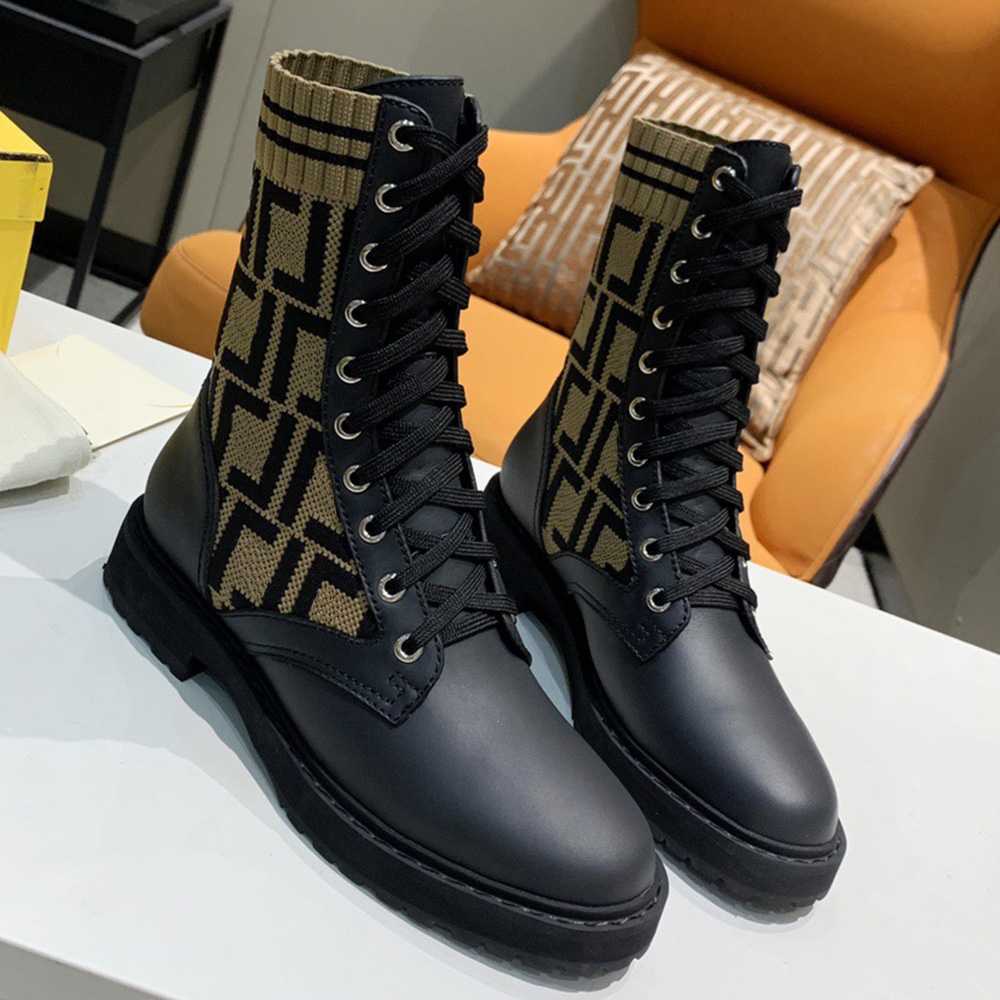 Rockoko Black leather biker boots stretch fabric Combat boot non slip rubber soles made from black calfskin sock high top trim brand theme contrasting sport stripes
Rockoko Black leather biker boots stretch fabric Combat boot non slip rubber soles made from black calfskin sock high top trim brand theme contrasting sport stripes