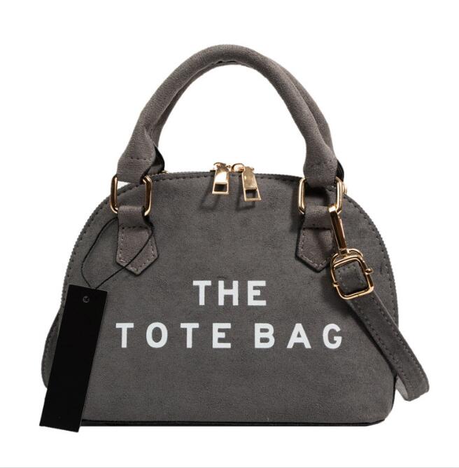 New PU Leather Suede Shell Bag Simple Letters Shoulder Crossbody Messenger Women's Bags Autumn and Winter Designer Purses and Handbag, As pic
New PU Leather Suede Shell Bag Simple Letters Shoulder Crossbody Messenger Women's Bags Autumn and Winter Designer Purses and Handbag, As pic