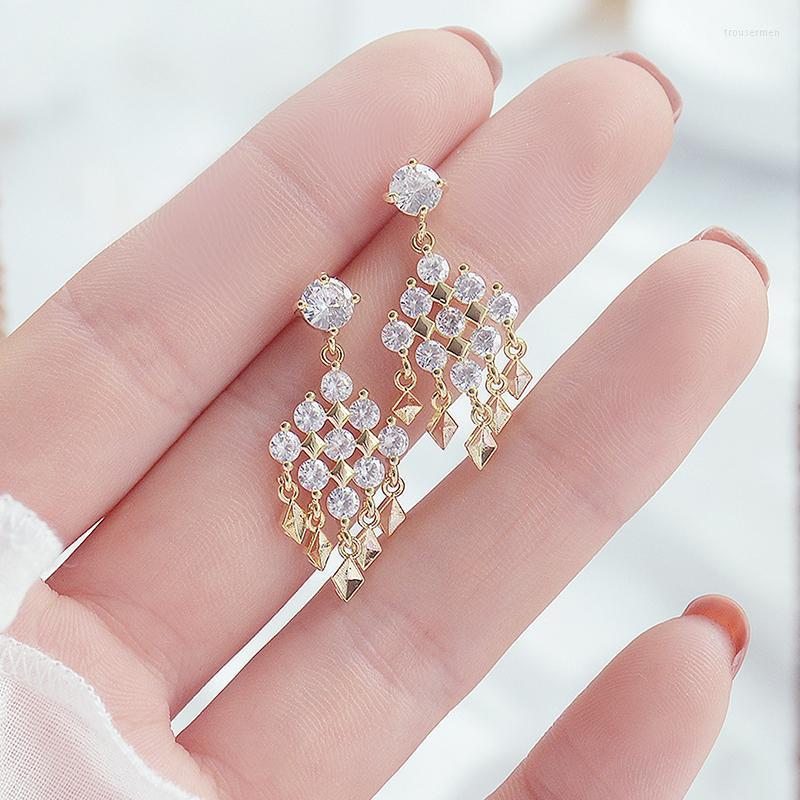 Dangle Earrings & Chandelier Korean Fashion Design Transparent CZ Tassel Women Earring Bohemia Gold Color Feminia Stud Pendant WholesaleDang
Dangle Earrings & Chandelier Korean Fashion Design Transparent CZ Tassel Women Earring Bohemia Gold Color Feminia Stud Pendant WholesaleDang