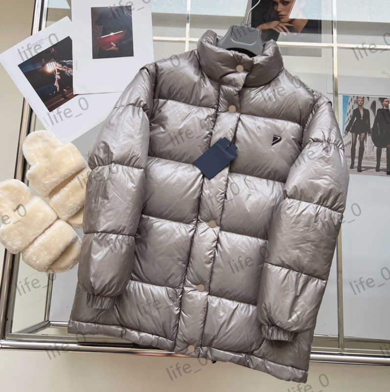 Brand Down Jackets Triangular leather logo Pure color Puffer Coat Tops Removable Sleeves Two Wear Winter Coats Casual Joker Warm Fashion Womens Jacket 1970
Brand Down Jackets Triangular leather logo Pure color Puffer Coat Tops Removable Sleeves Two Wear Winter Coats Casual Joker Warm Fashion Womens Jacket 1970