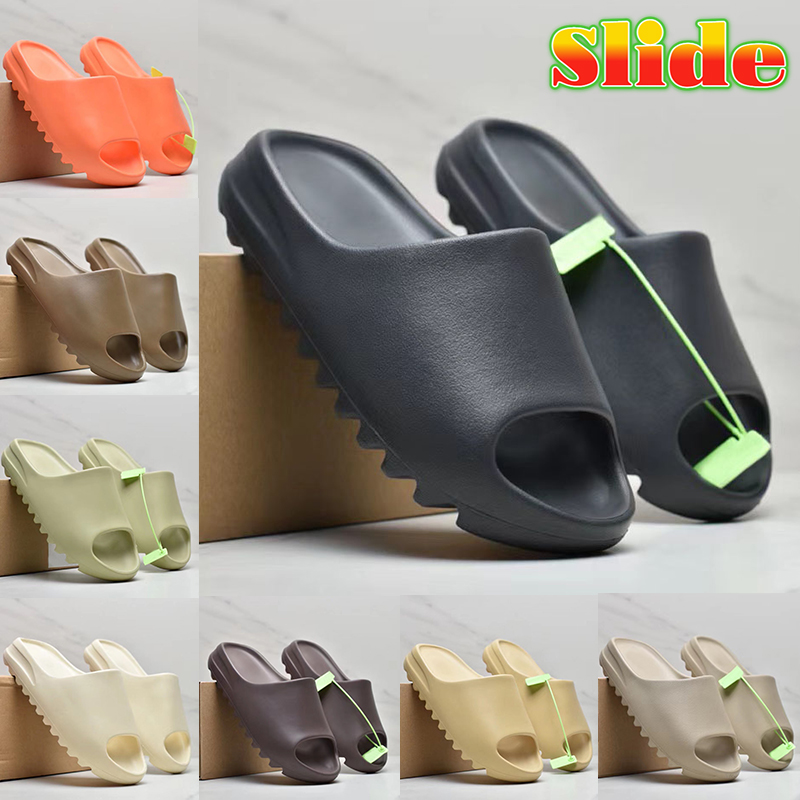 Top slippers foam runner mens slide designer sandal west shoes bone onyx enflame orange soot resin Ochre desert sand mist Vermilion flat beach luxury slides with box, Bubble wrap packaging
Top slippers foam runner mens slide designer sandal west shoes bone onyx enflame orange soot resin Ochre desert sand mist Vermilion flat beach luxury slides with box, Bubble wrap packaging