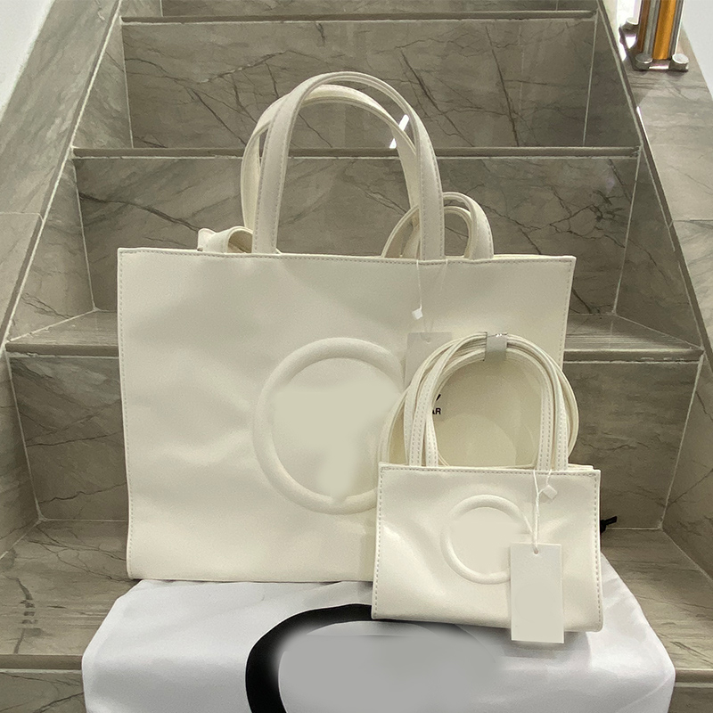 Tote bag 2022 Cross shopping bag Designer purse and handbag Women's luxury brand Pu Women's shoulder bag
Tote bag 2022 Cross shopping bag Designer purse and handbag Women's luxury brand Pu Women's shoulder bag