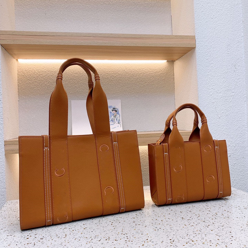Fashion designer tote bags Leather Woody Tote Bag Big Capacity Handbags 26cm / 36cm, Black
Fashion designer tote bags Leather Woody Tote Bag Big Capacity Handbags 26cm / 36cm, Black