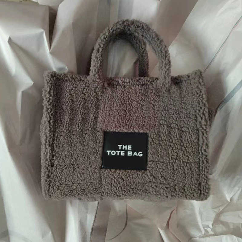 Totes designer bags handBags Marc Fur thetote Bag women Winter Wool Letter Casual Portable One Shoulder Messenger Bag 220913, Canvas--blue--32.5cm
Totes designer bags handBags Marc Fur thetote Bag women Winter Wool Letter Casual Portable One Shoulder Messenger Bag 220913, Canvas--blue--32.5cm