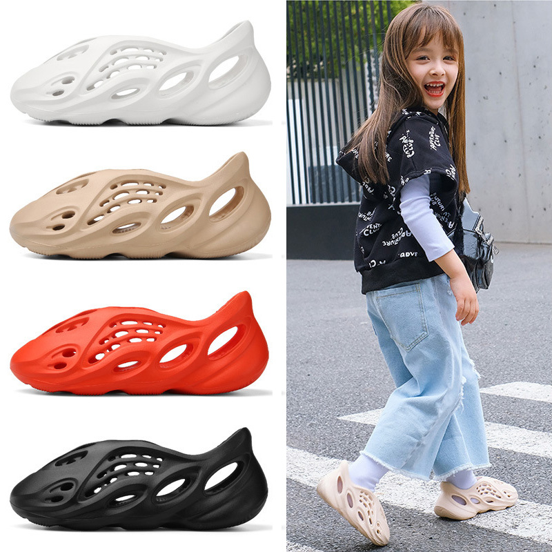 Kids Sandals Slides Men Women Slippers bone Resin Desert Sand foam runner Ararat Rubber Summer yzzzys Slides Designer Slip-on west Brown Flat slide Running shoes, No box
Kids Sandals Slides Men Women Slippers bone Resin Desert Sand foam runner Ararat Rubber Summer yzzzys Slides Designer Slip-on west Brown Flat slide Running shoes, No box